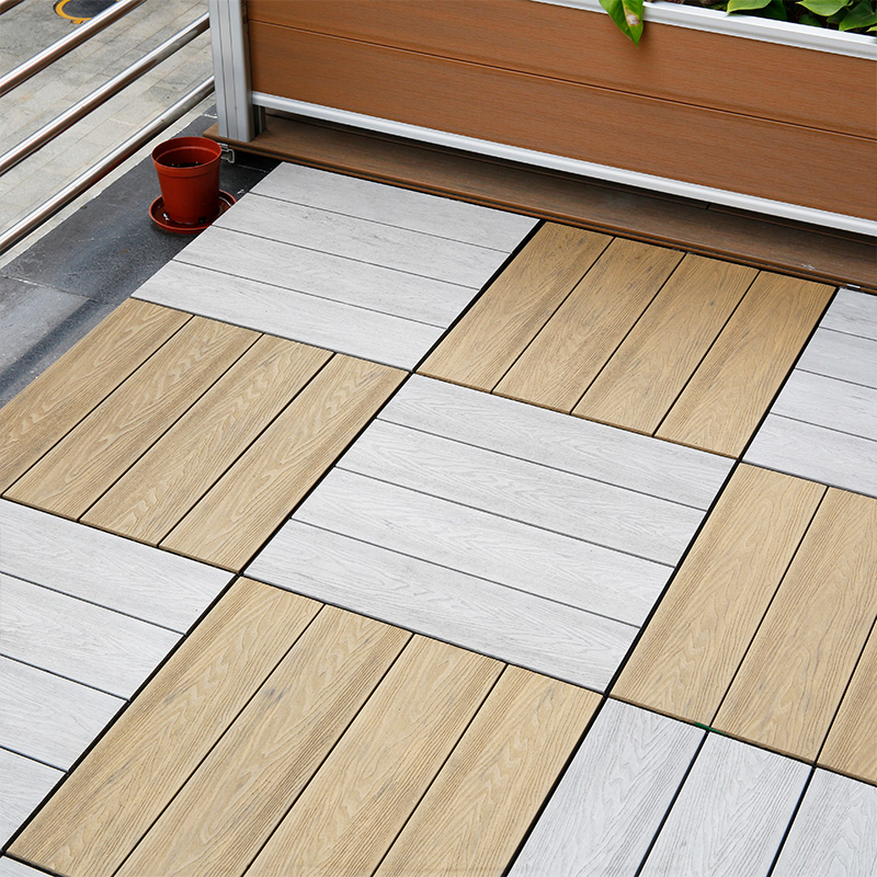 interlocking deck tiles on grass